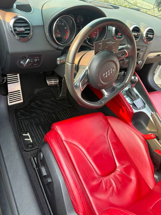 The same Audi TT after detailing: clean dash, vents, wheel and seats